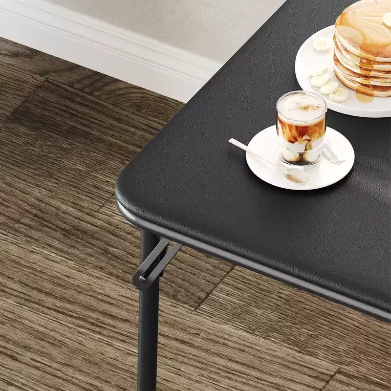 Tavolo pieghevole quadrato beige/nero/grigio, piano imbottito in PU, 4 posti