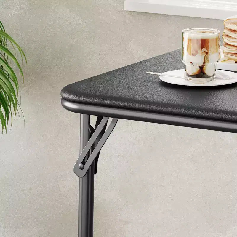 Tavolo pieghevole quadrato beige/nero/grigio, piano imbottito in PU, 4 posti