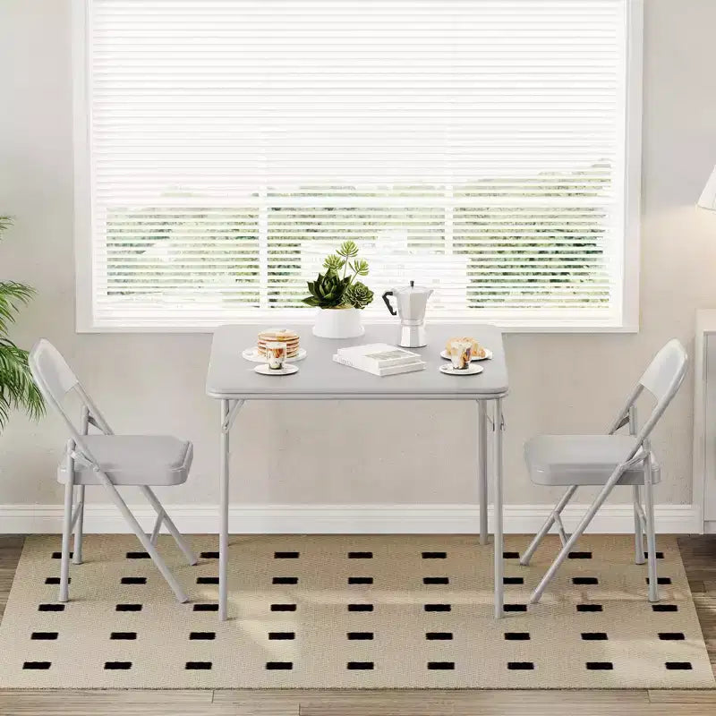 Tavolo pieghevole quadrato beige/nero/grigio, piano imbottito in PU, 4 posti