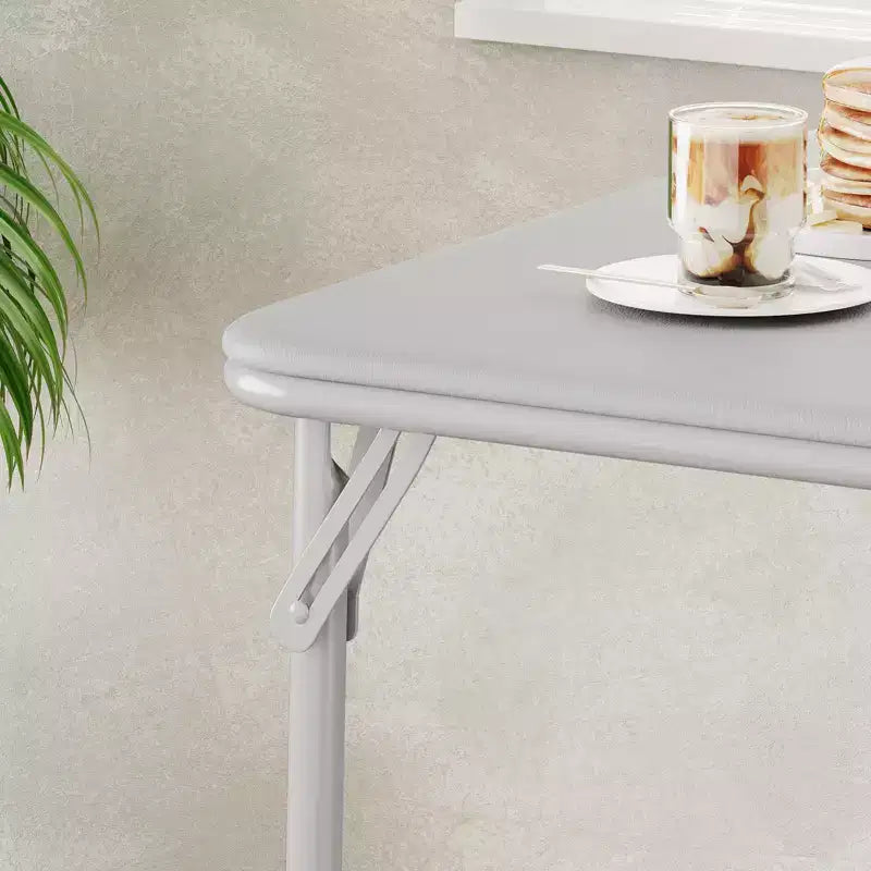 Tavolo pieghevole quadrato beige/nero/grigio, piano imbottito in PU, 4 posti